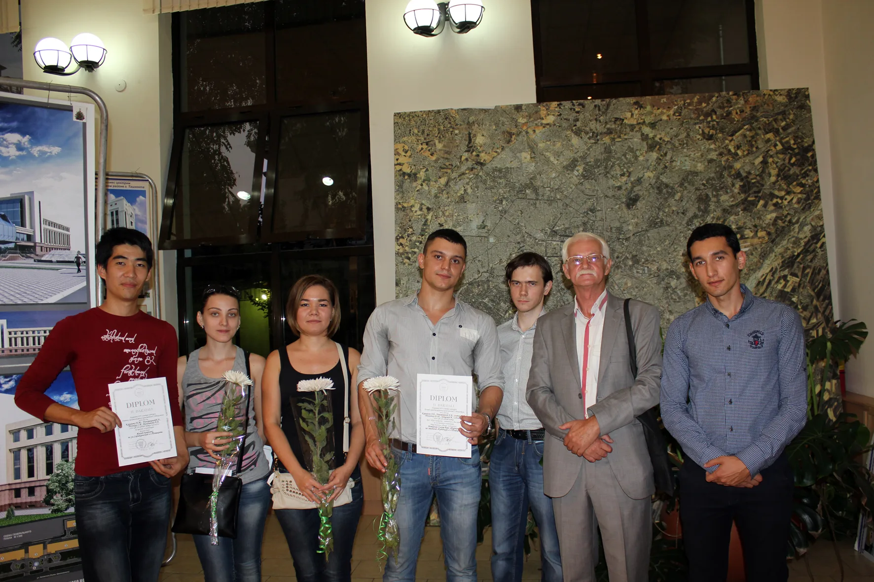 Alexander Kuranov, Maxim Oltyan, Davron Talipov and the SAD team with their diplomas at an architecture review, 2010