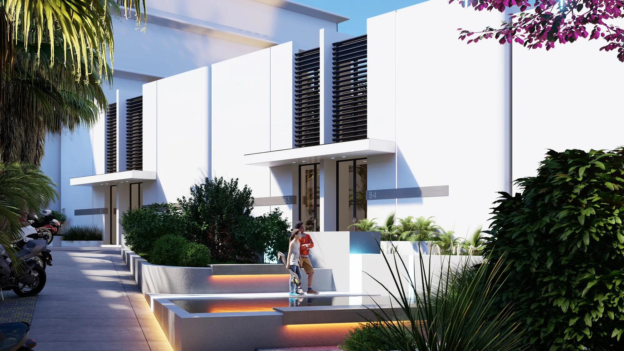 The shared street of the complex with the villas’ garage entrances