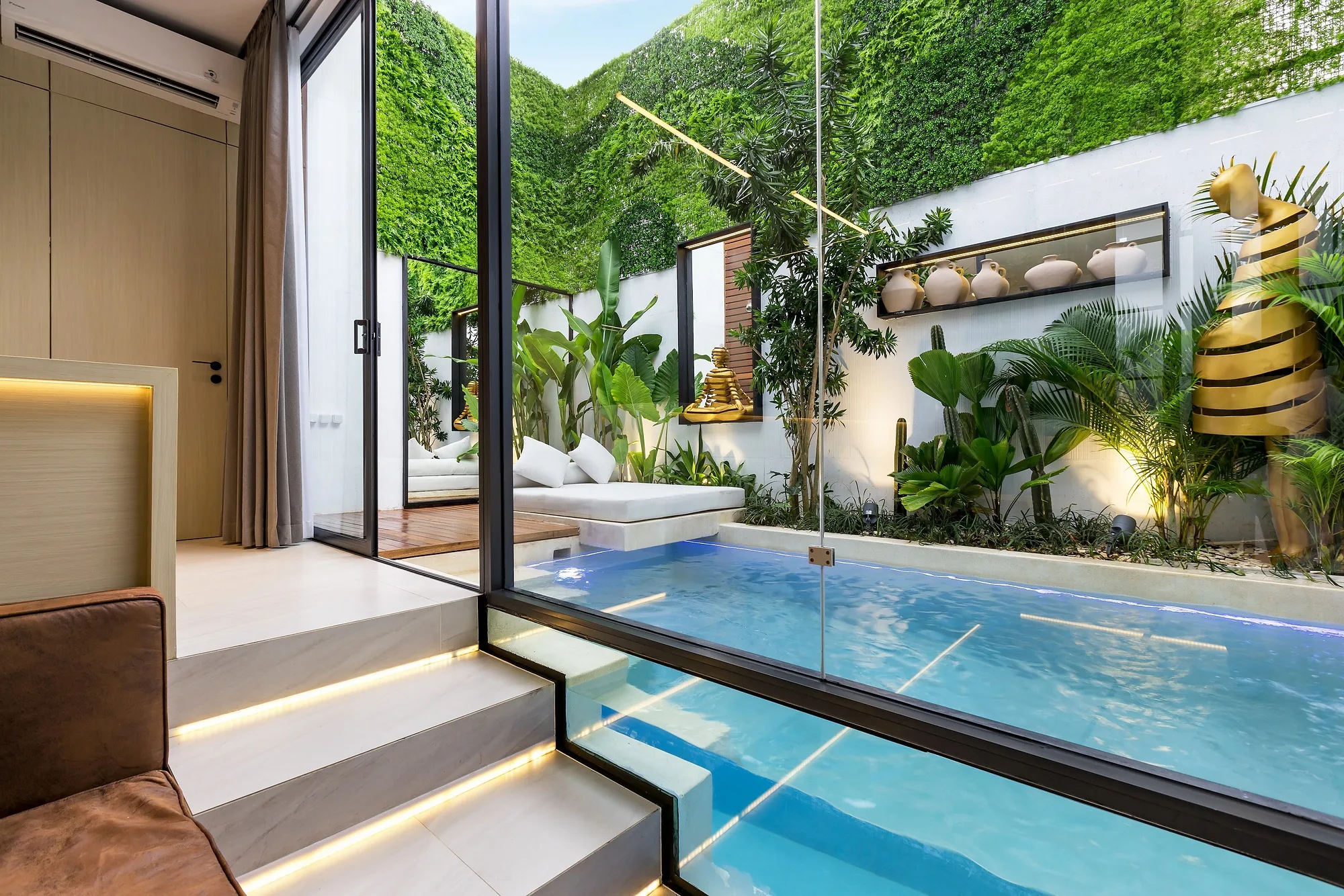 The courtyard pool with entry steps and timber decking