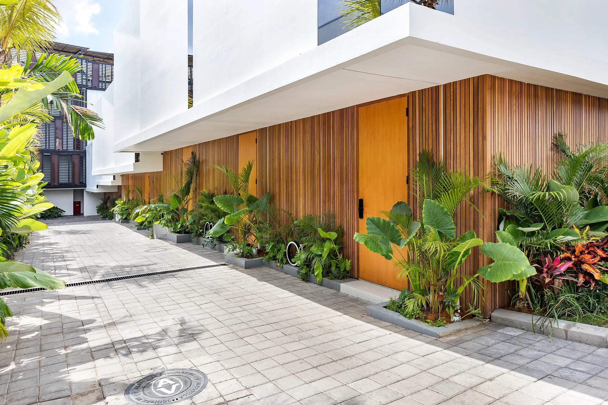 A house entrance with its timber-clad elevation