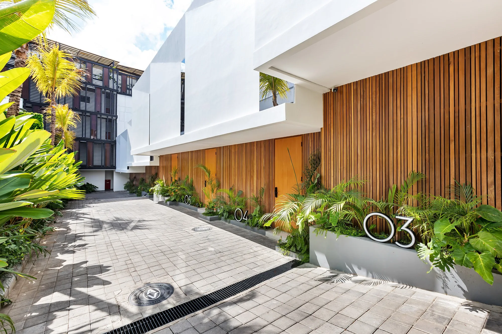 A pedestrian street with its timber elevations and planting