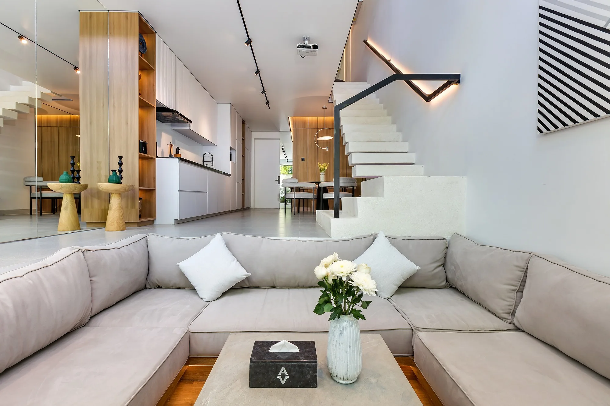 The living room with its timber insert and stair