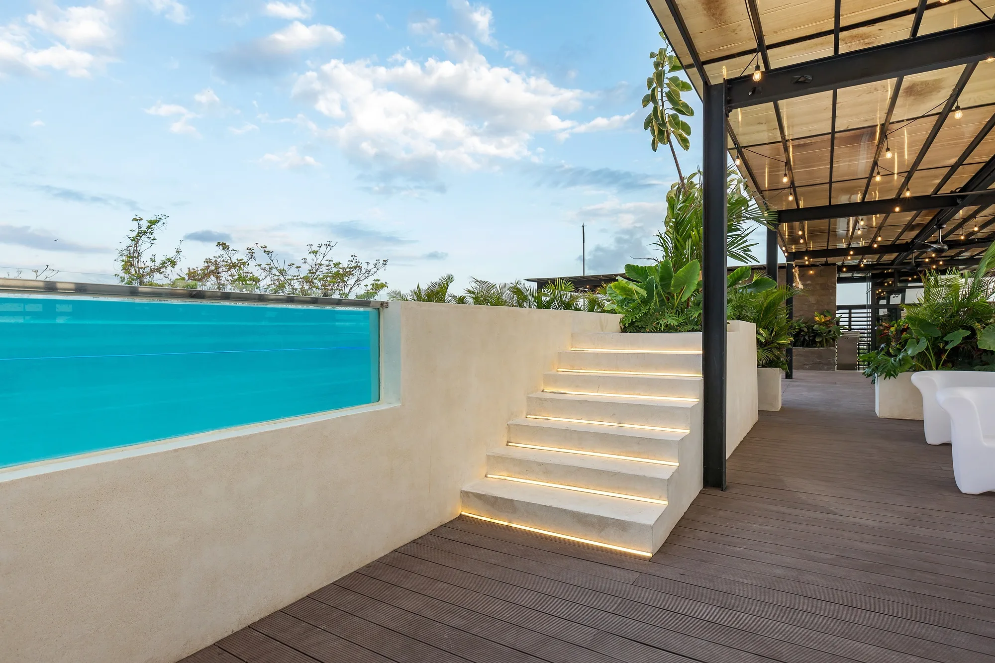 The rooftop pool and the stair up to the lounge