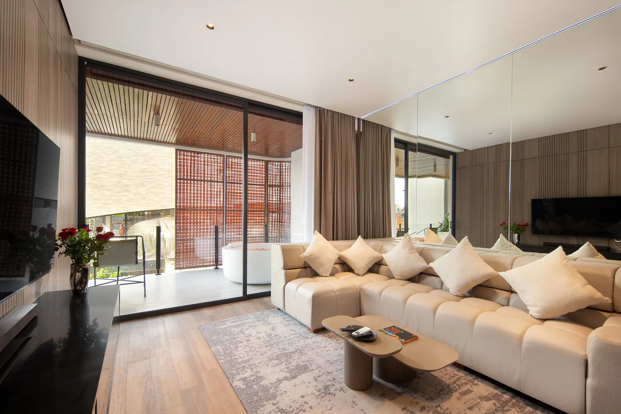 The apartment living room opening onto the terrace