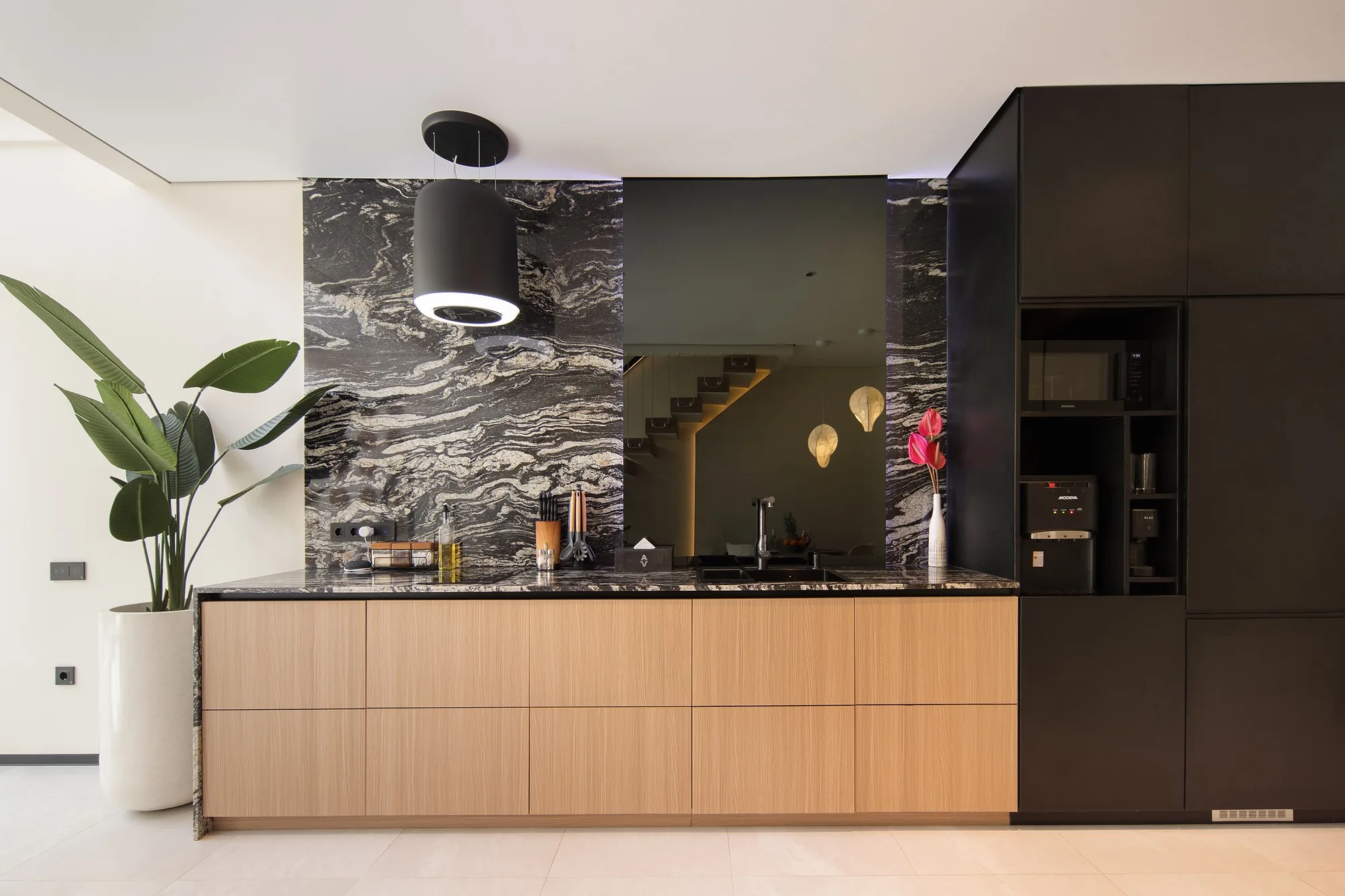 The townhouse kitchen with its stone cladding