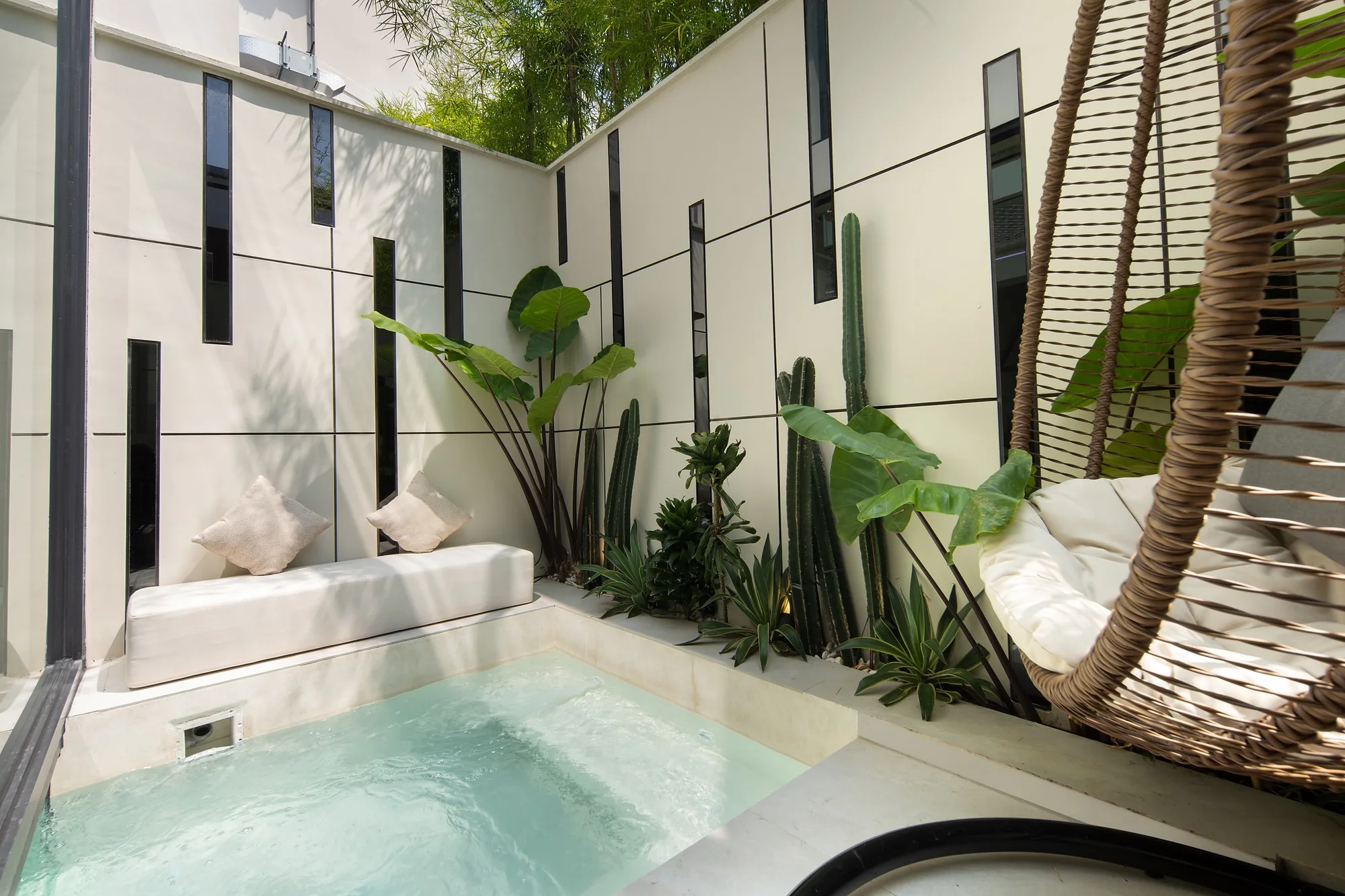 The townhouse courtyard with pool and hanging chair