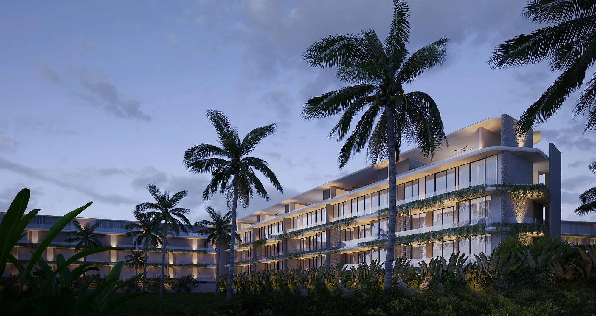 The facade from the garden side, palms along the building