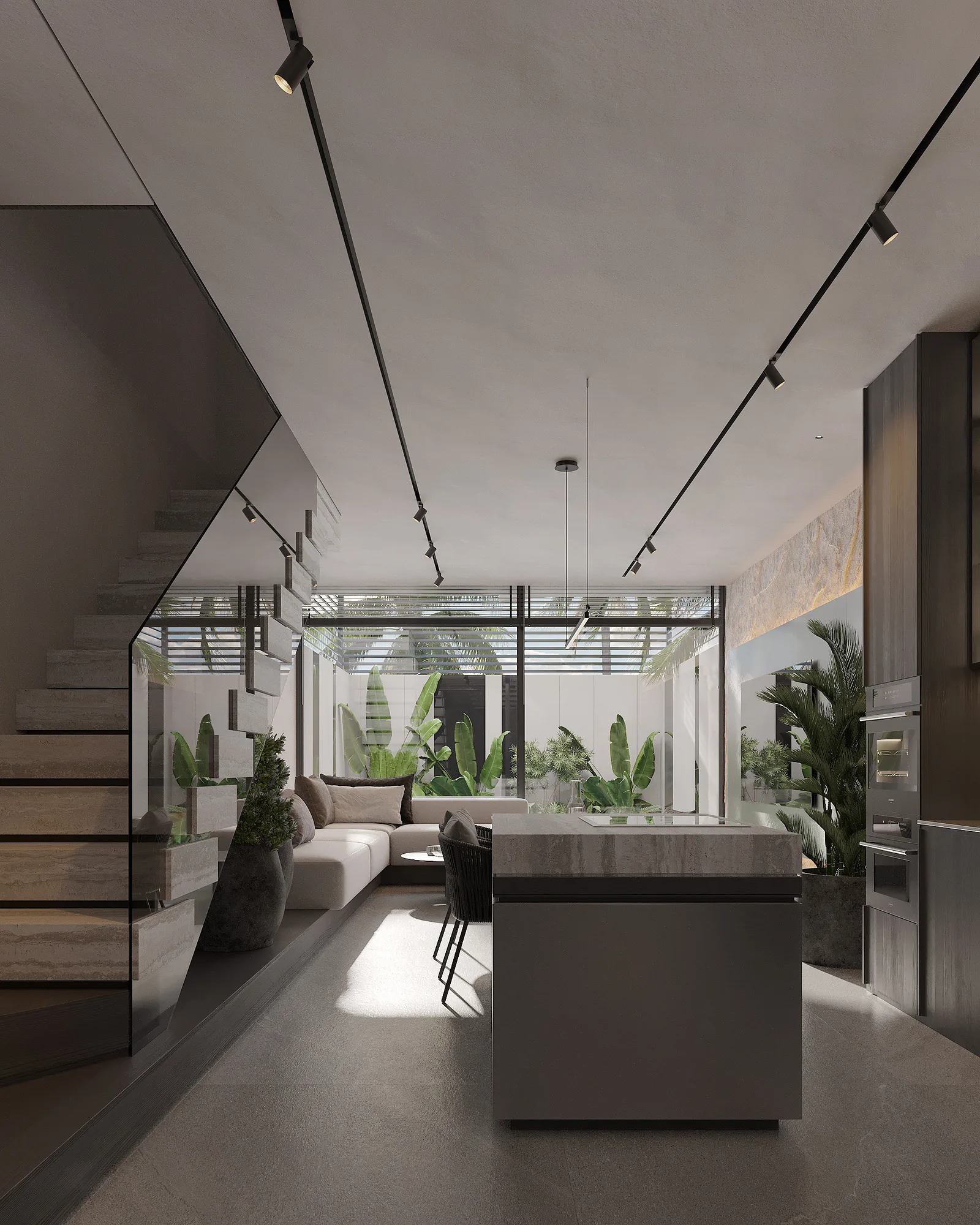 A 2BR apartment at Alex Villas 8: the kitchen island under the stair in a double-height space — SAD studio