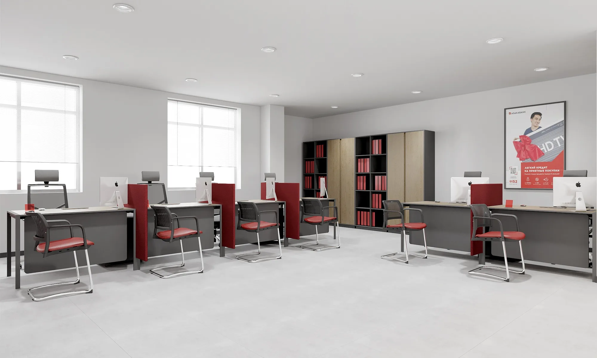 A row of workstations with red screen partitions