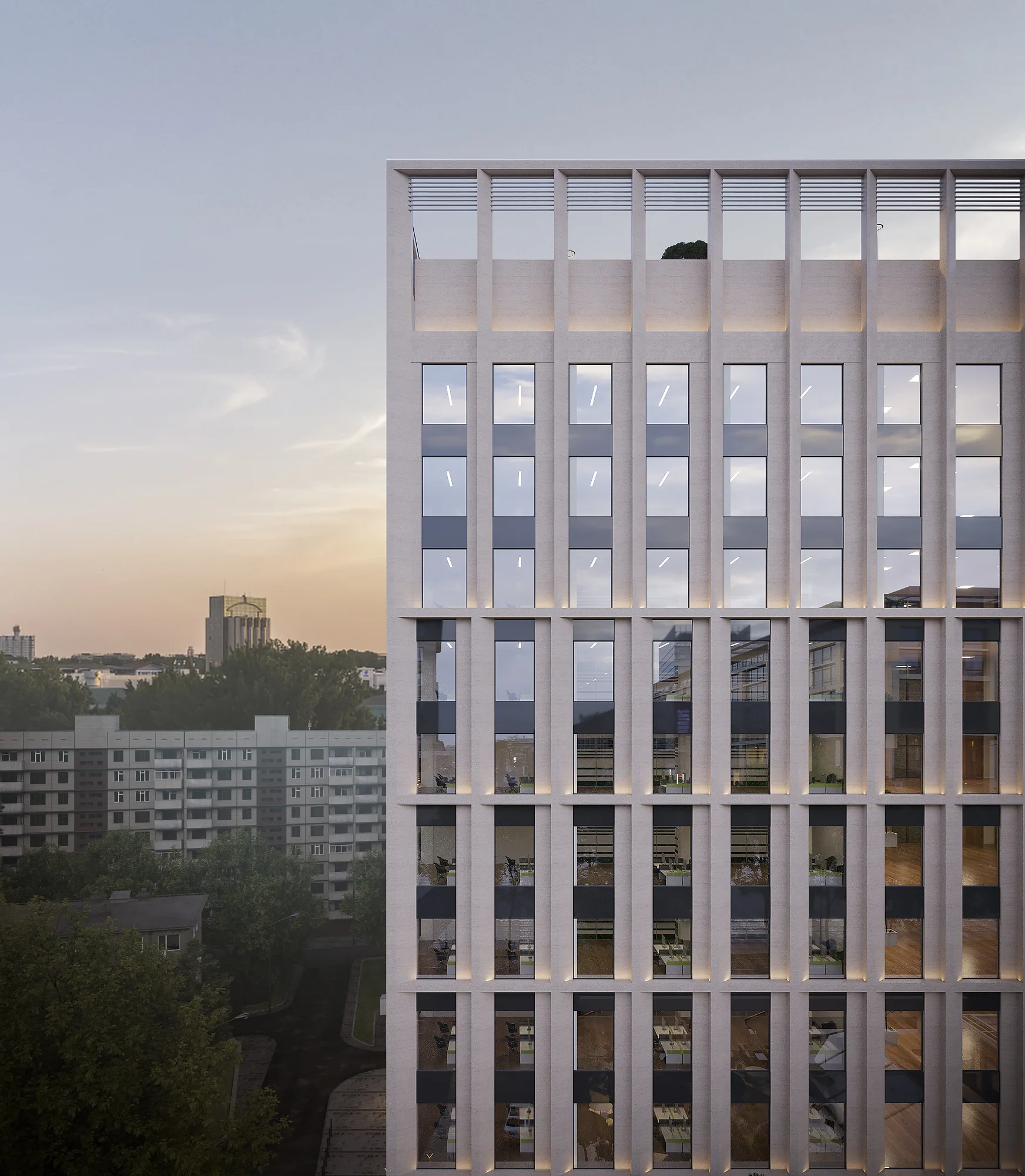 Facade of the business centre in Tashkent at sunset: vertical piers and office-floor windows against the city — SAD studio
