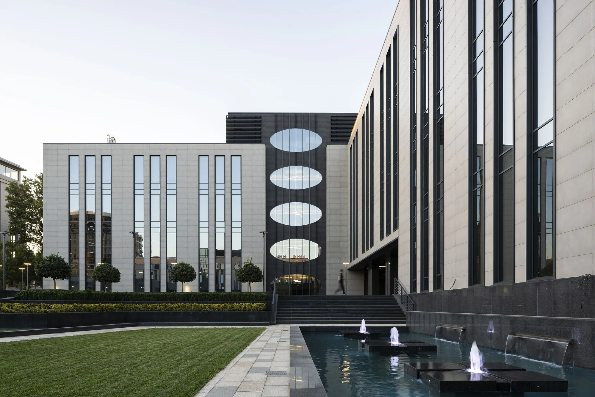 Blocks of the business centre along the fountain pool
