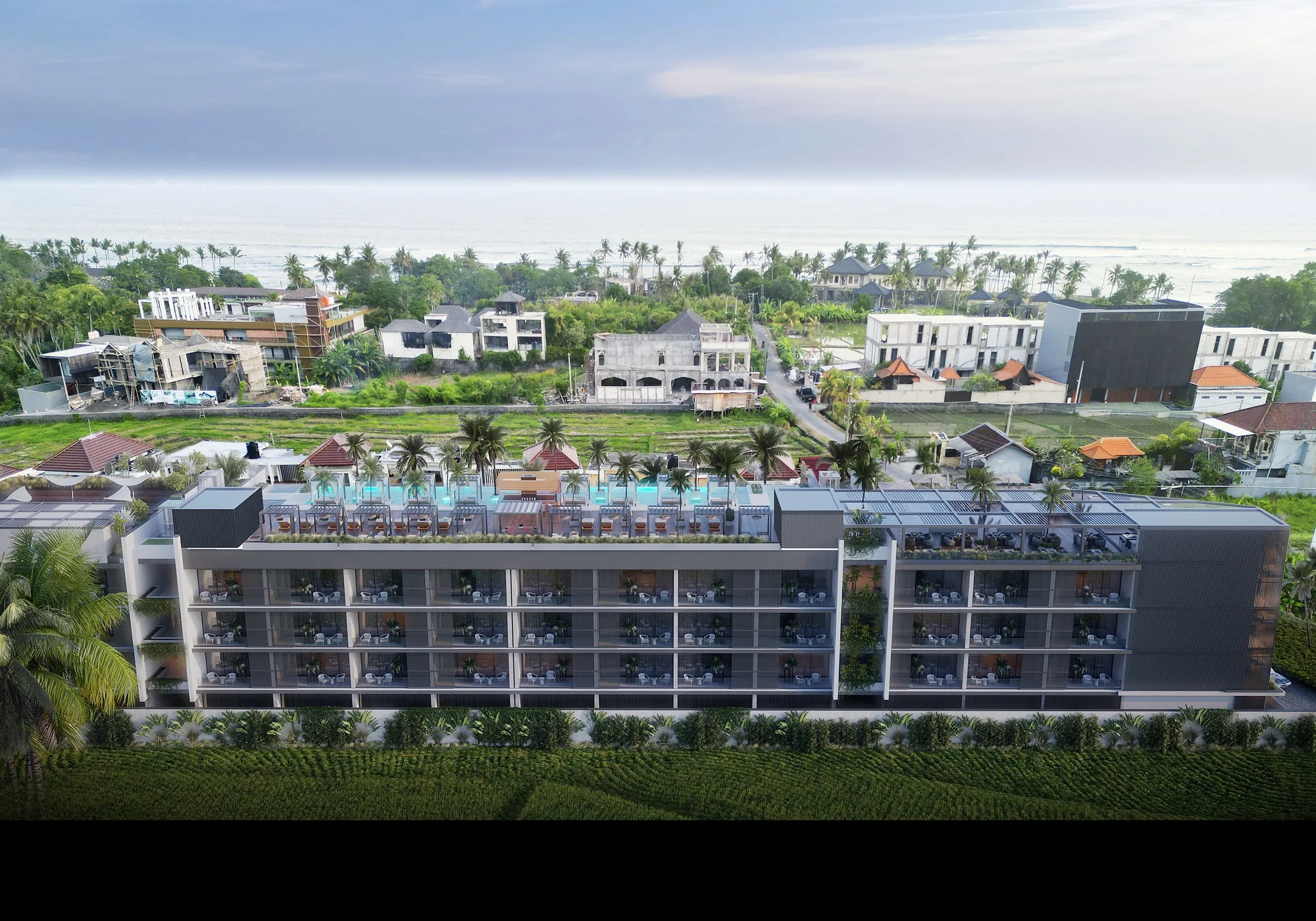 The Cemagi complex in daylight: the facade along the rice fields