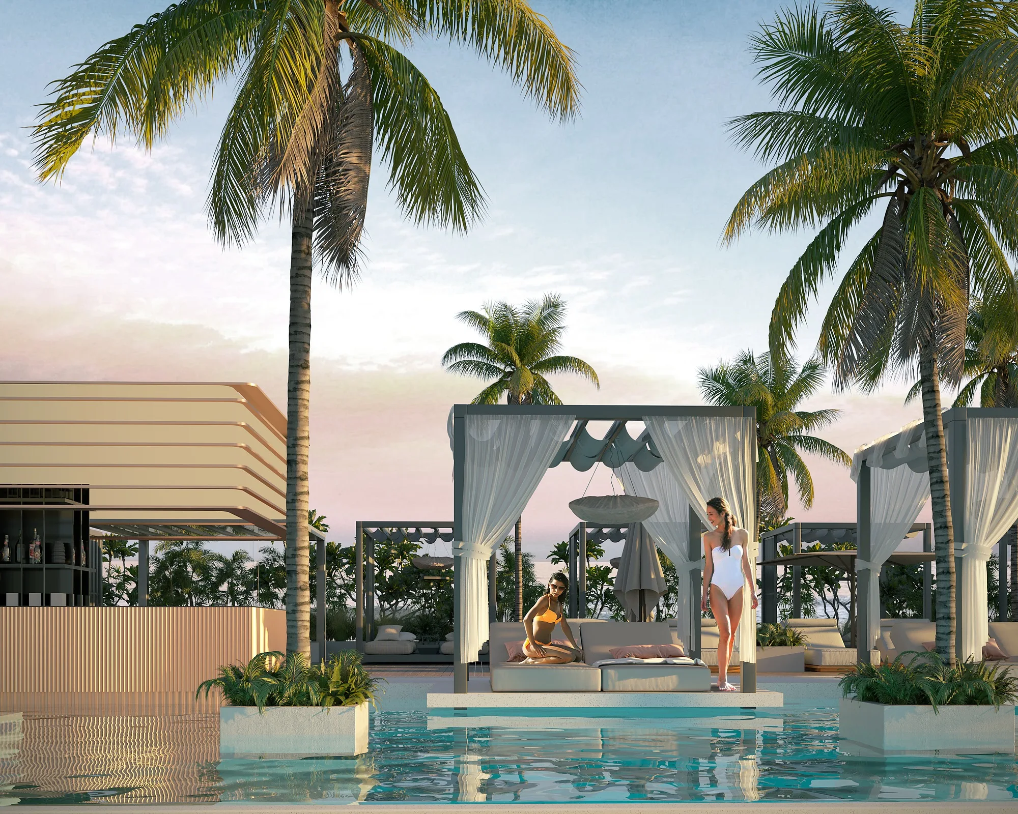 The pool among palms on the complex terrace