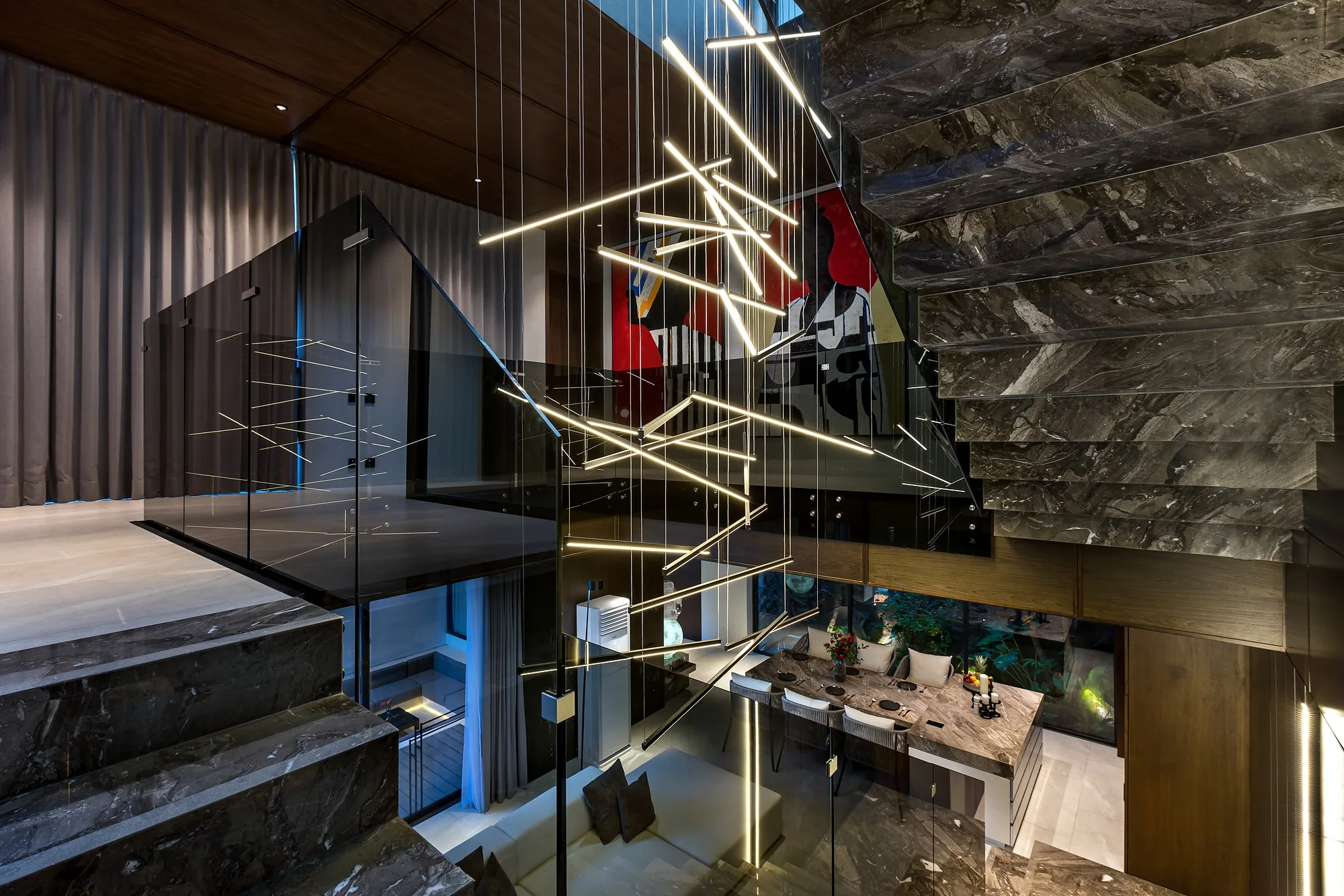 Concealed lighting on the treads and niches in the dark interior