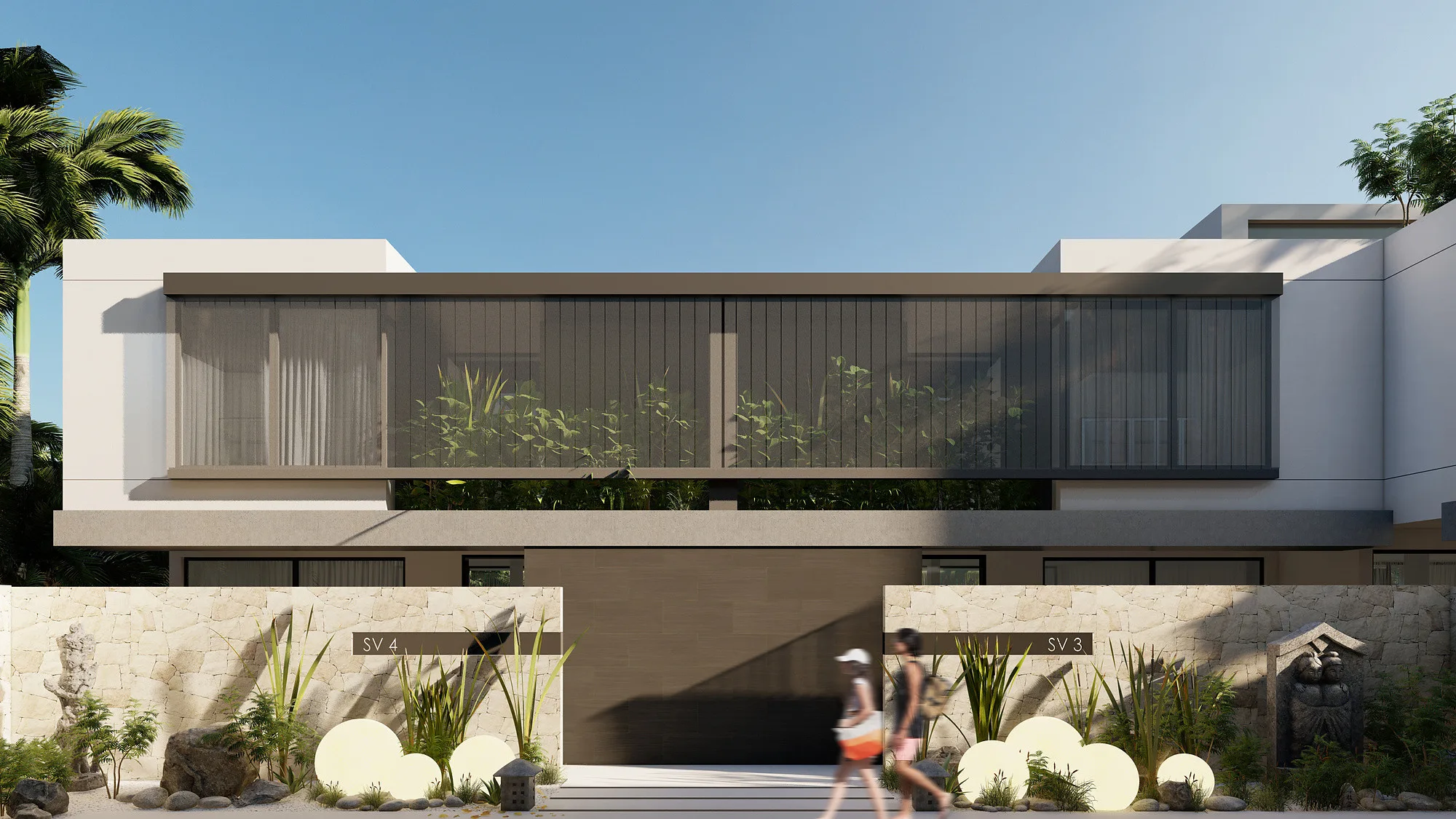 Street elevation of the Jalan Tegal Cupec villas in Bali: the stone base, ribbon glazing and perimeter planting — SAD studio