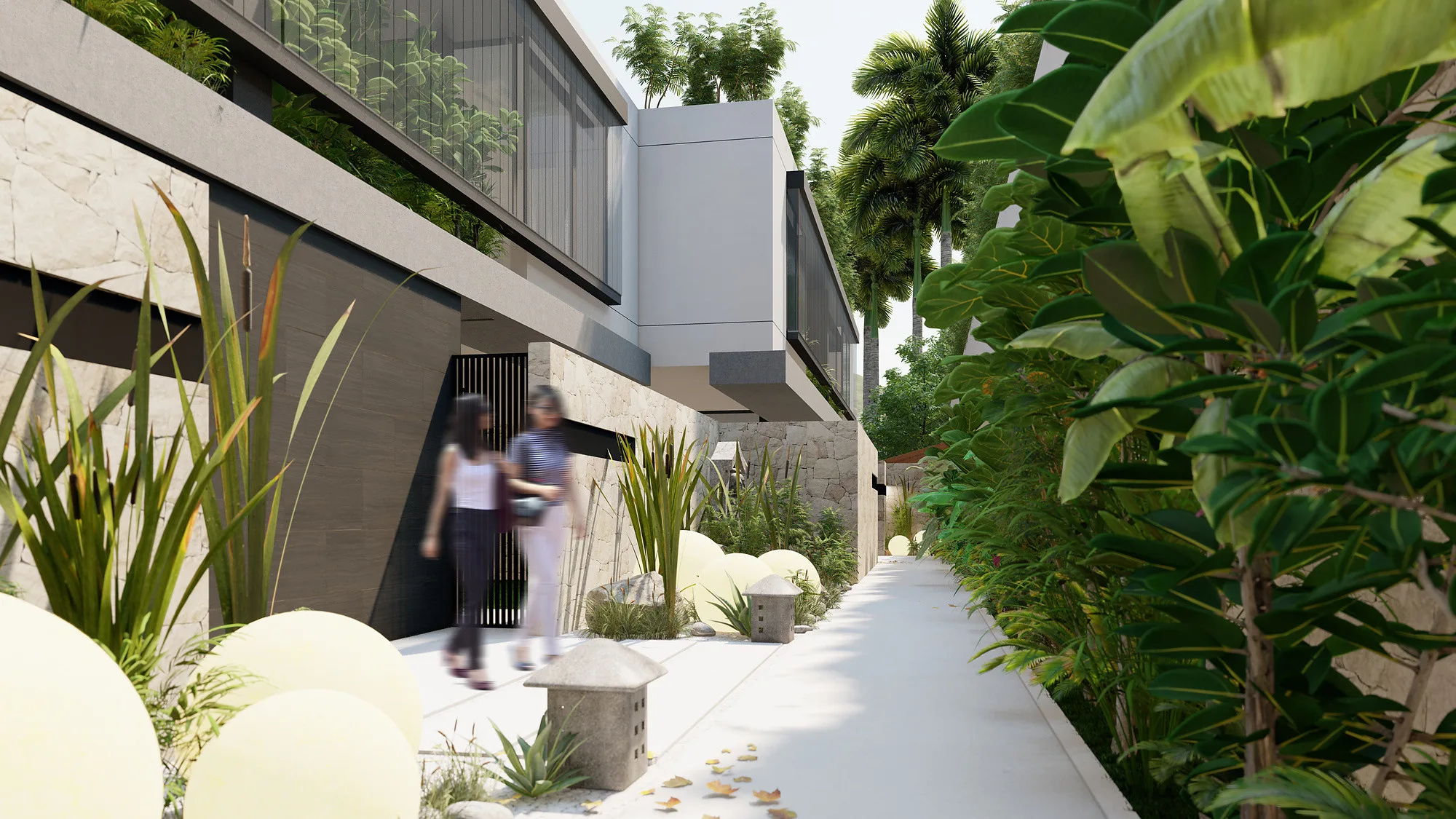 Lane between the Jalan Tegal Cupec villas in Bali: the paved path, stone and tropical plants — SAD studio