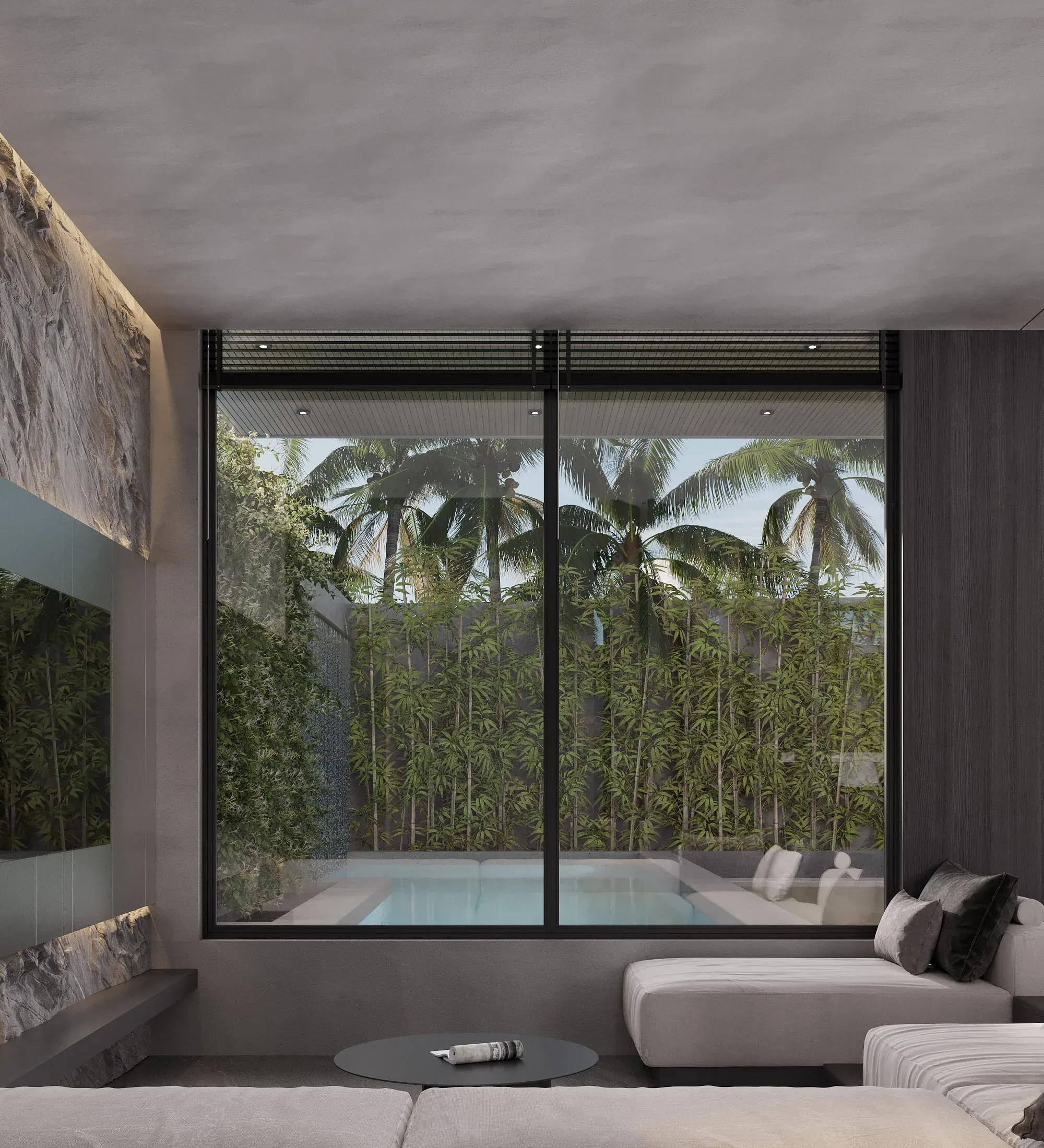 Lounge of a Jalan Tegal Cupec villa in Bali: a sofa by the glazing overlooking the pool and a green wall — SAD studio