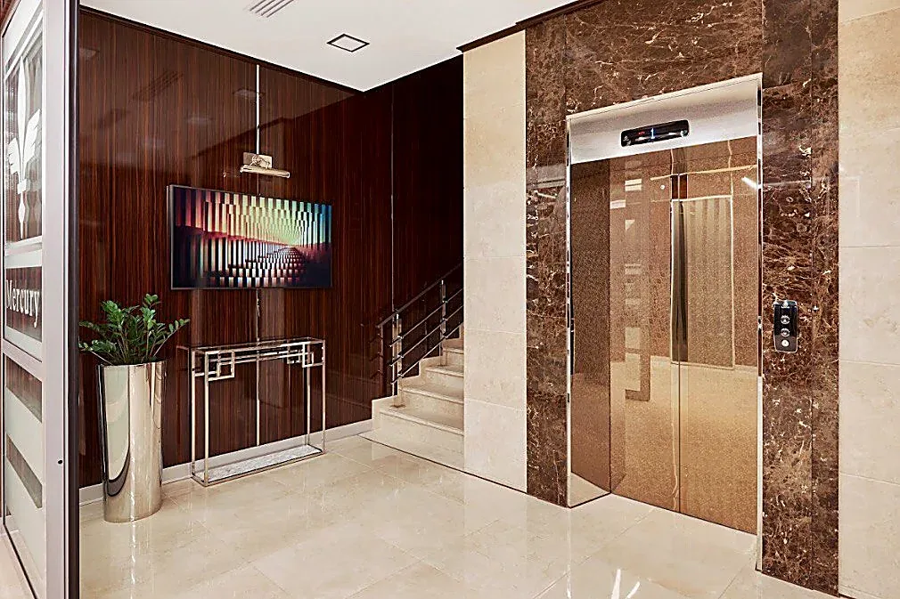 The lift lobby with its marble lining