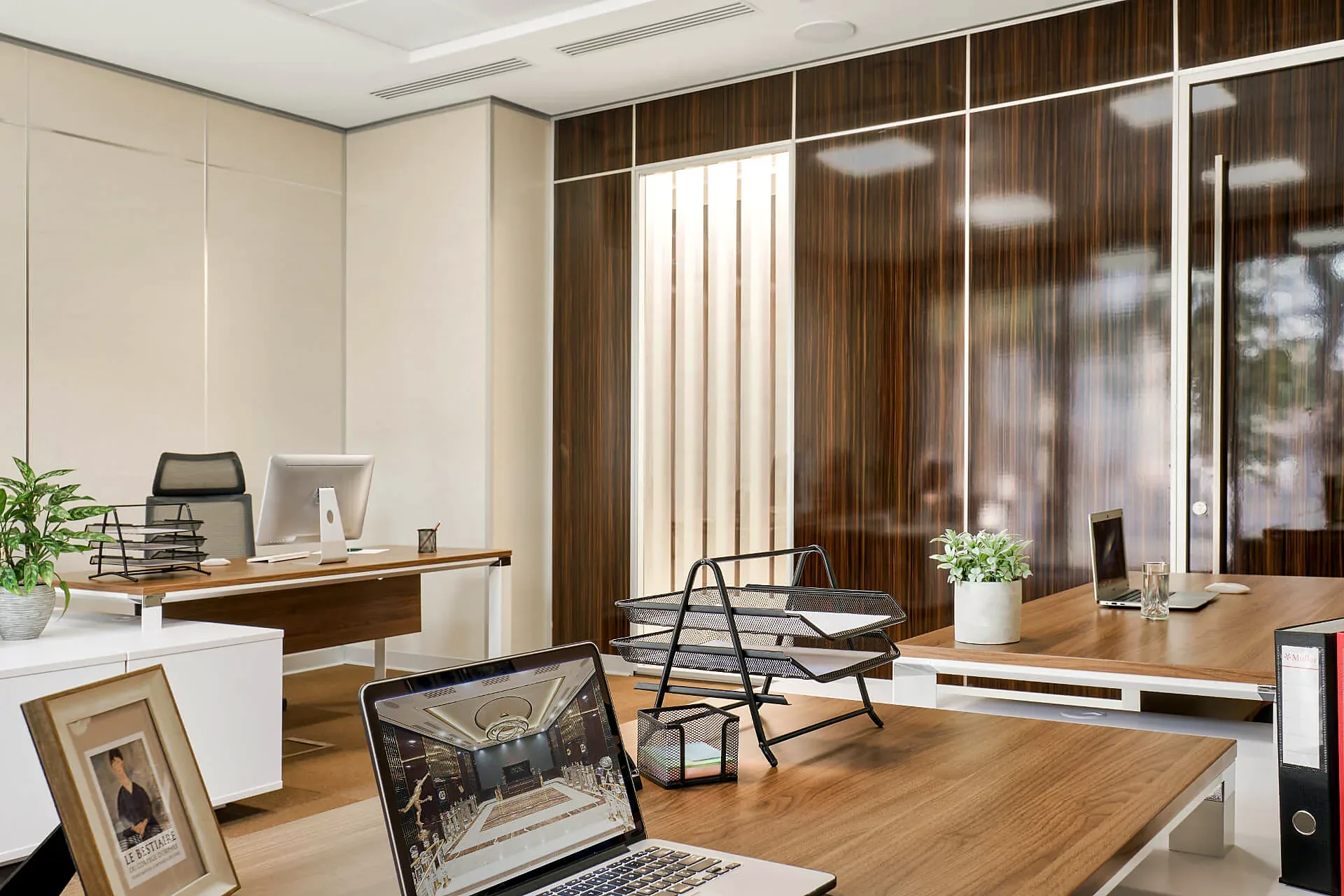 An office with desks by the window