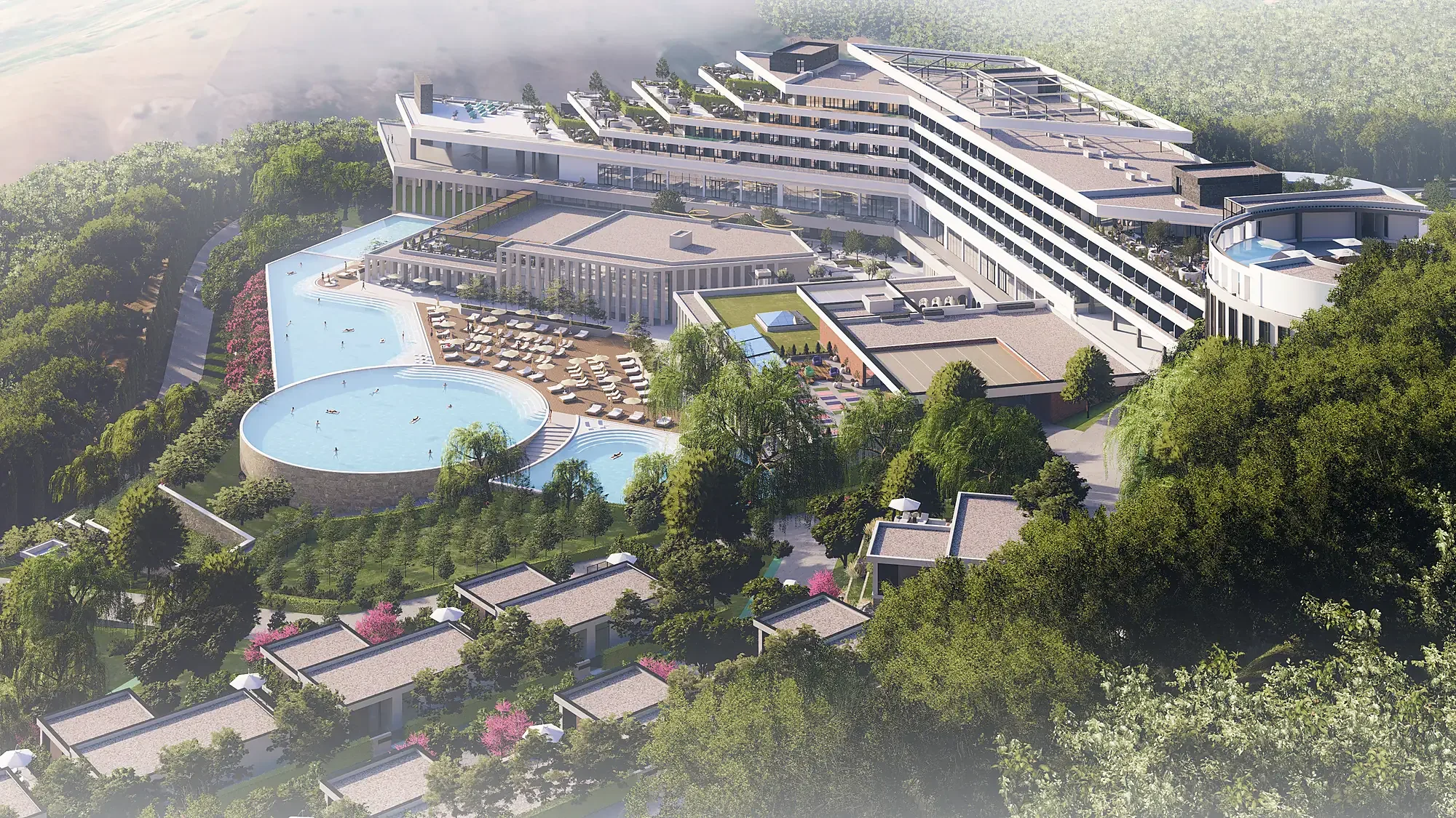The complex from above: the building, the pools and the villas