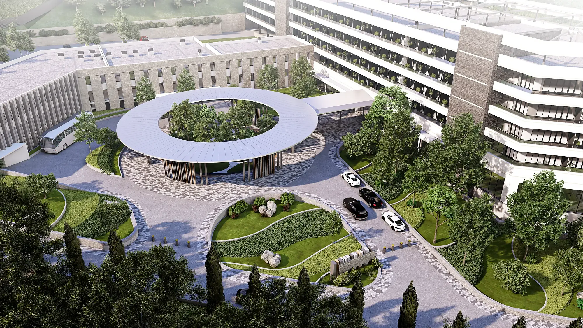 The circular pavilion and the pools in the landscape