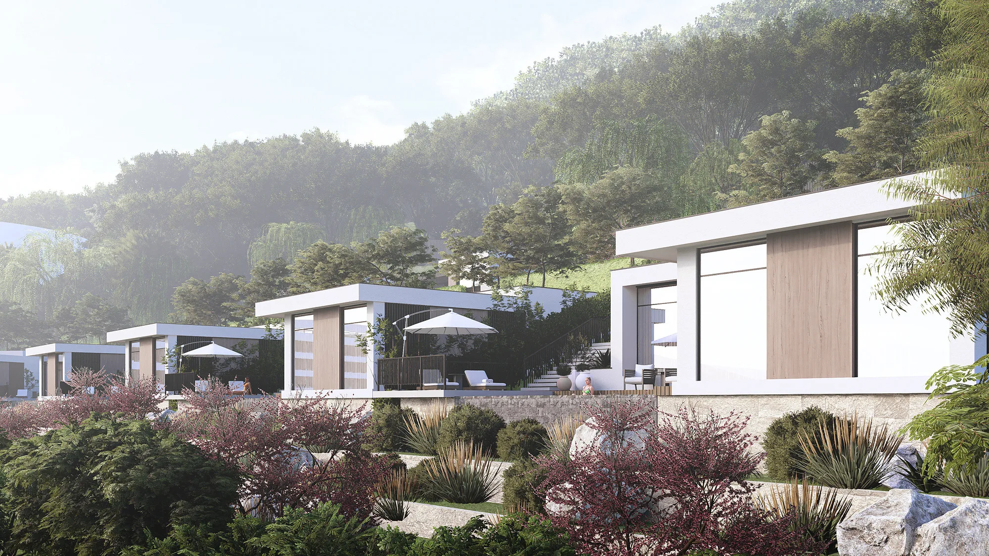 The villas of the complex in the mountain landscape