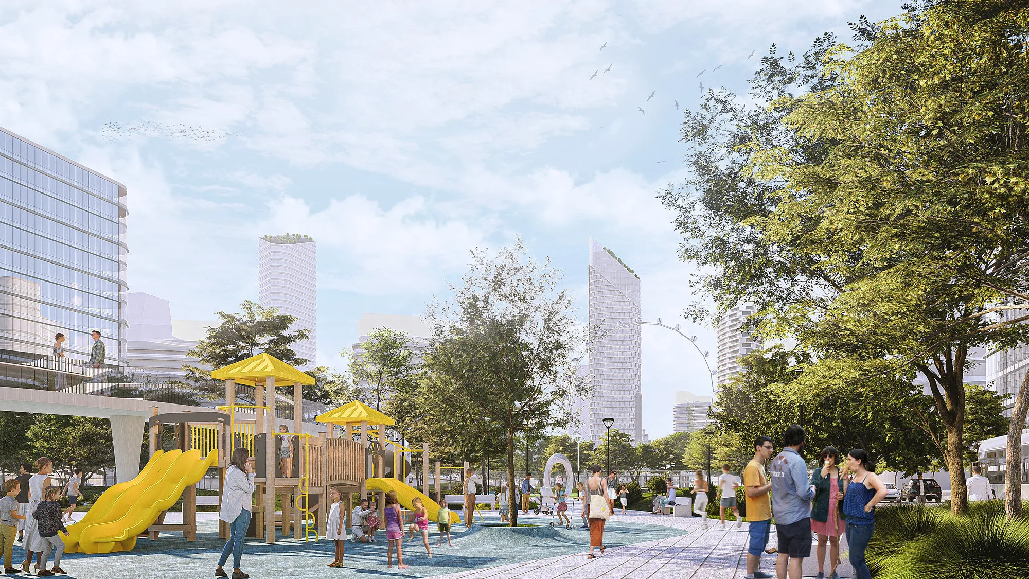 A playground in a courtyard of the district, with the towers in the background