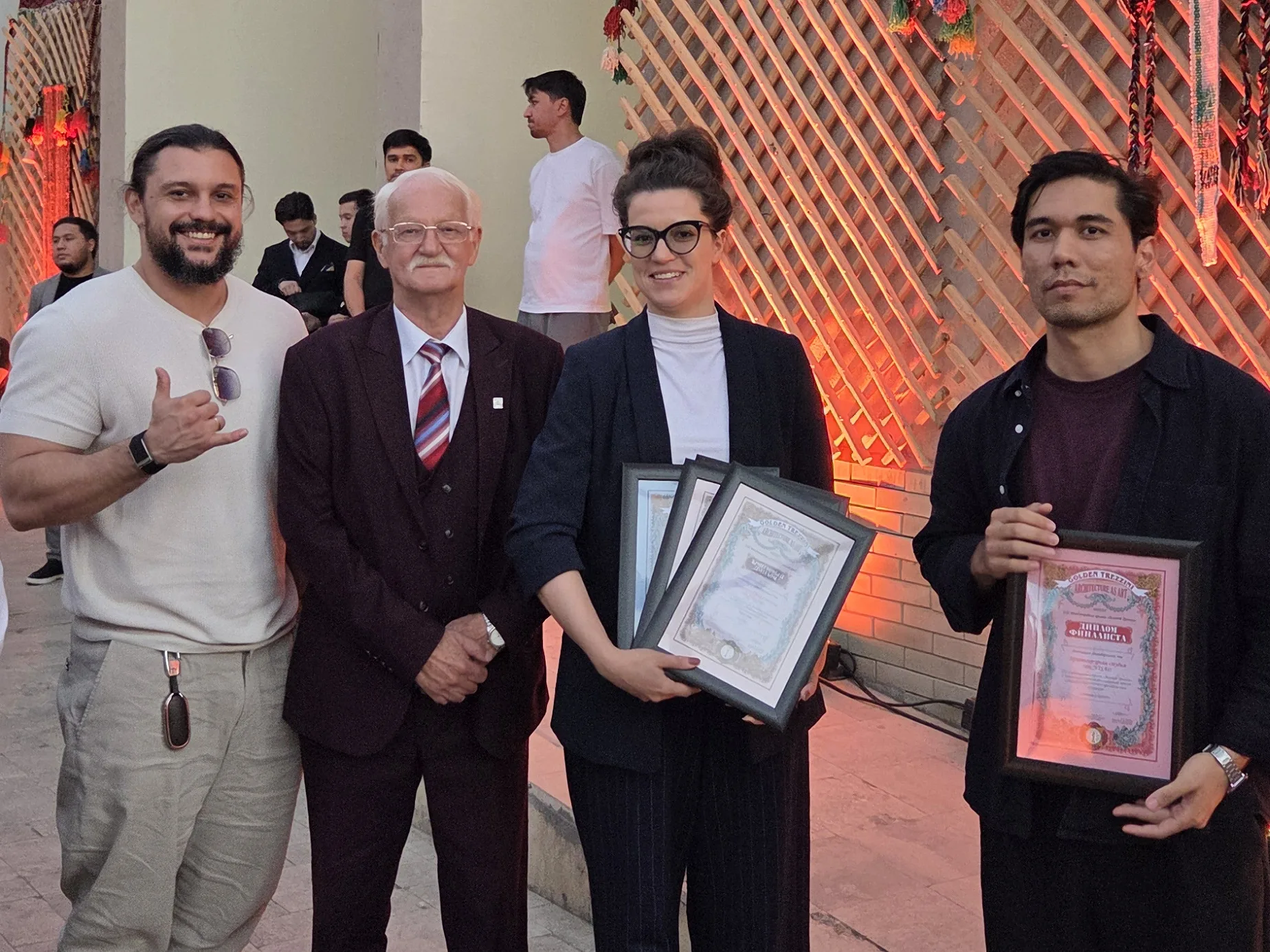 Maxim Oltyan, Alexander Kuranov, Maria Sultanova and Davron Talipov with the Golden Trezzini diplomas at the Tashkent ceremony on 29 September