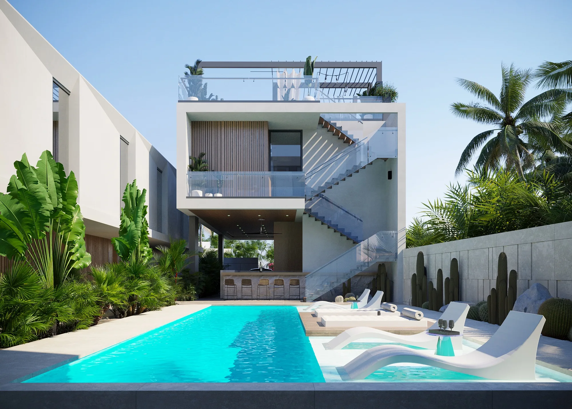 A villa courtyard with planting along the pool