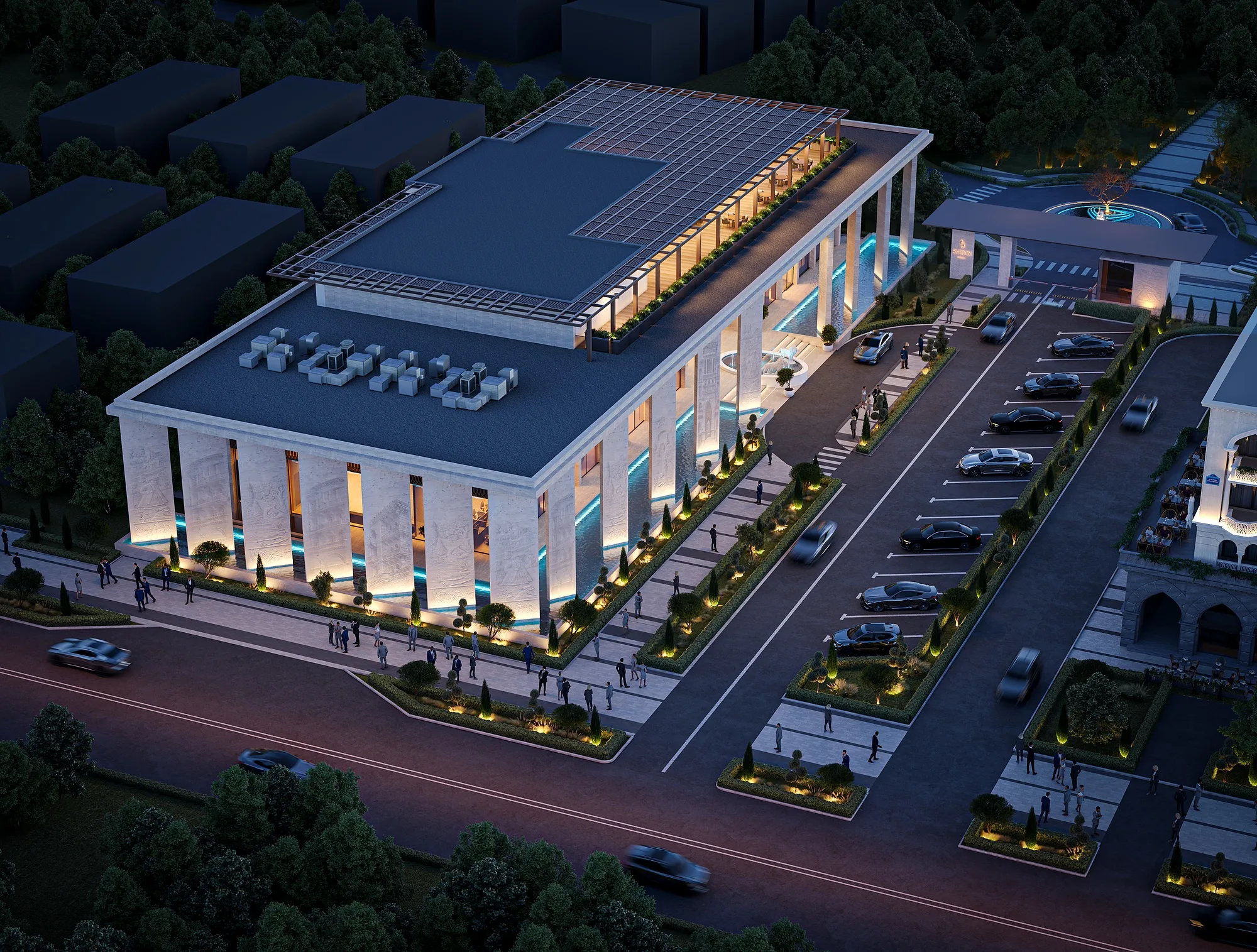 The complex at night from above, the roof lit