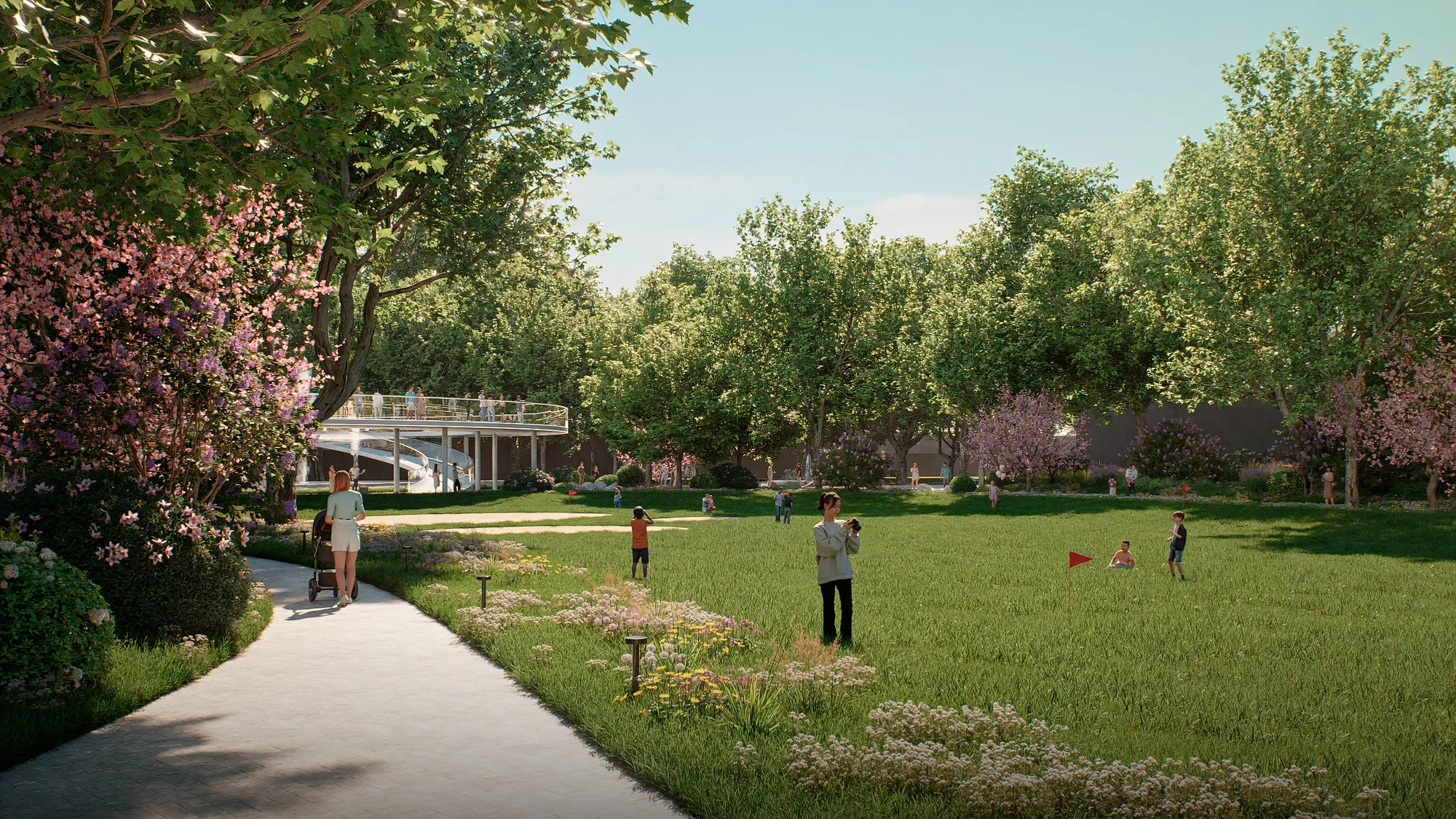 A walking path along the lawn, with blossom in spring