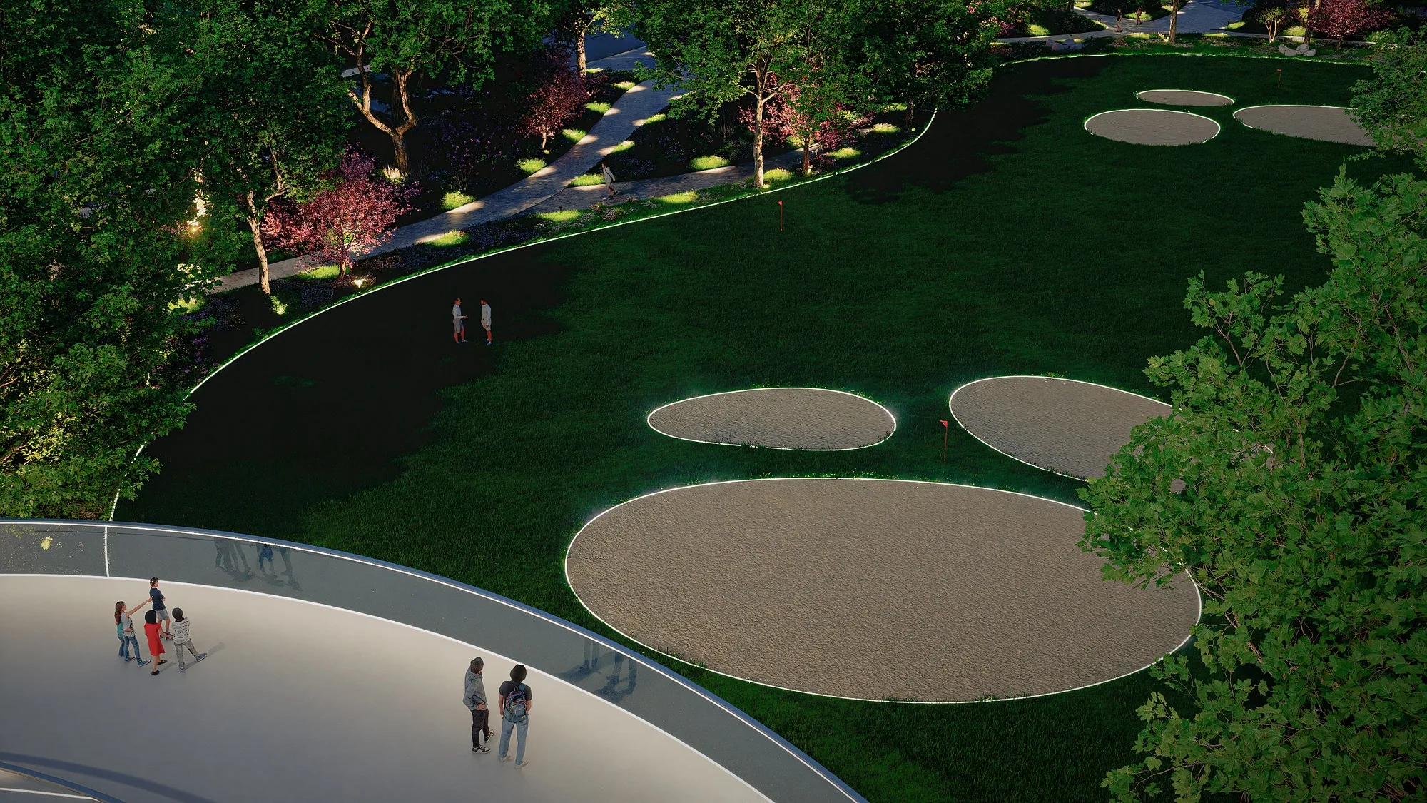 The park at night from above: paths, lawn and lines of light