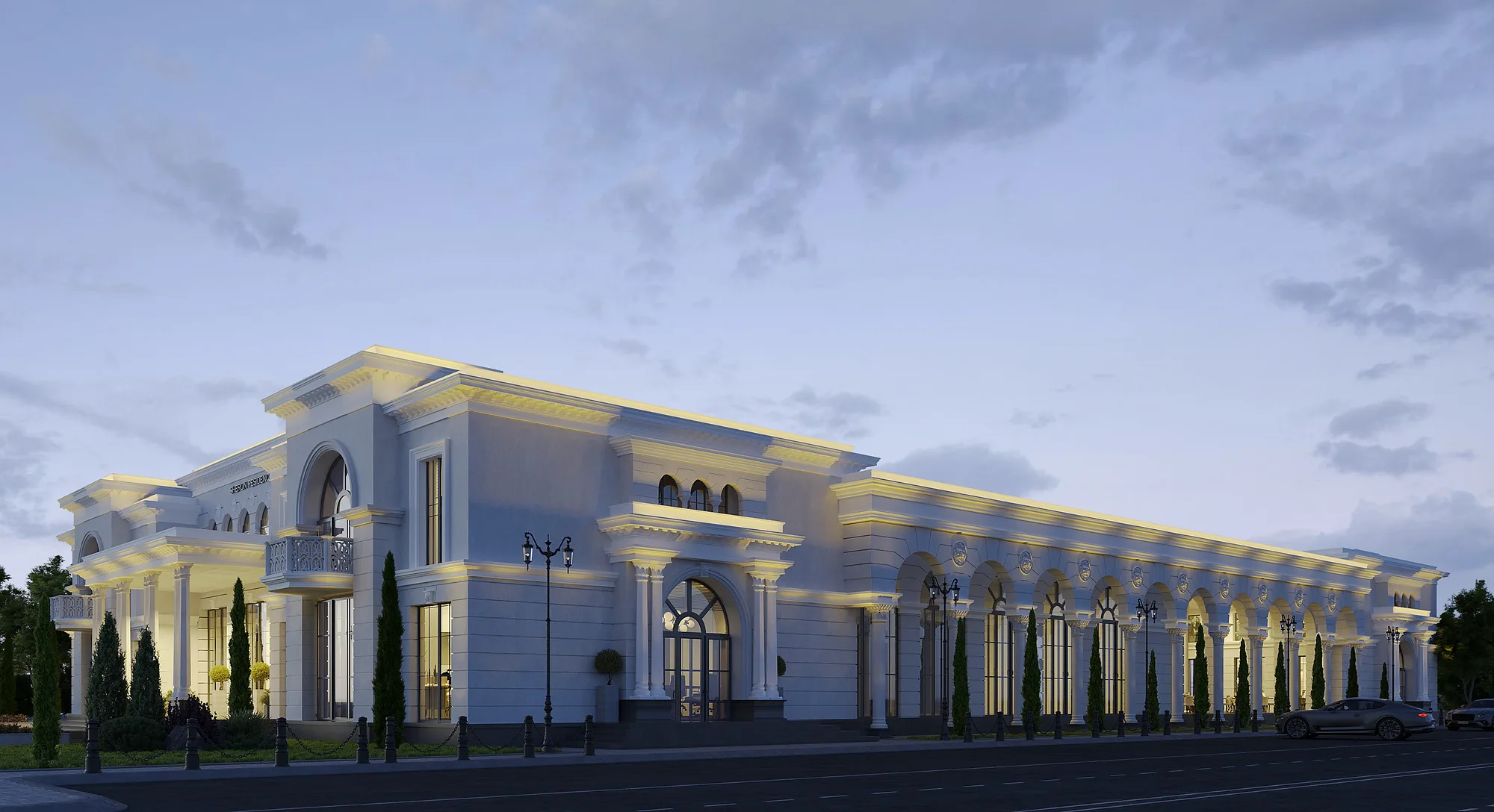 The Sheron administrative and sports block in the evening: the colonnade lit along its length