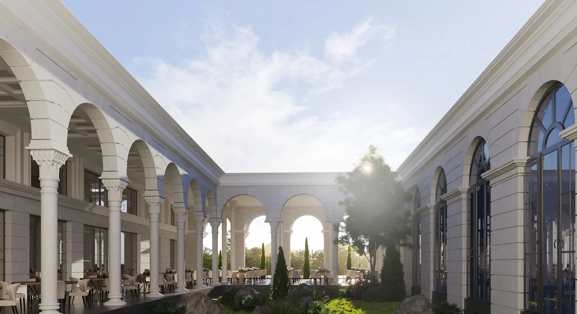 The courtyard of the Sheron administrative and sports block: arcades on both sides and tables
