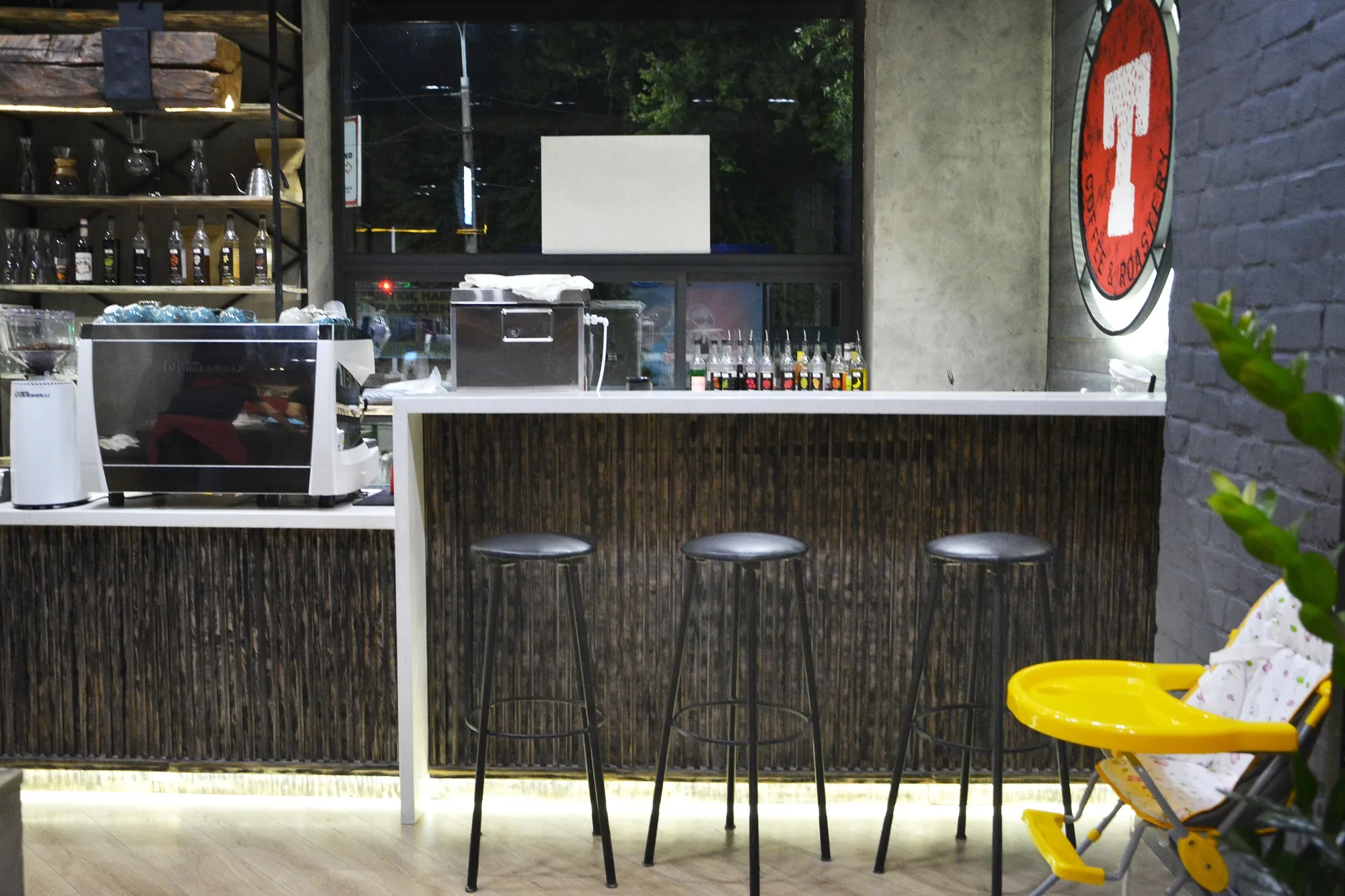 TIM'S Coffee & Roastery in Tashkent: the bar with floor-level lighting — SAD studio
