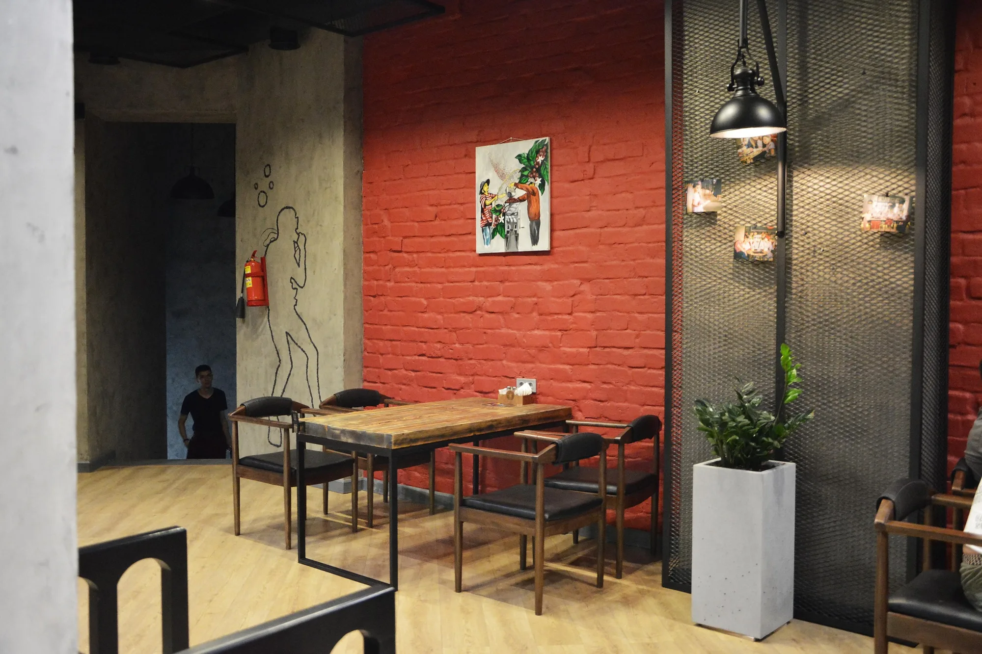 TIM'S Coffee & Roastery in Tashkent: tables by the red brick wall — SAD studio