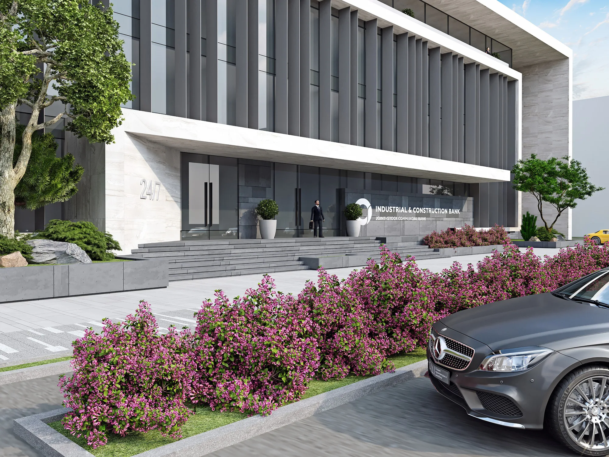 Entrance to the Uzpromstroybank branch in Nurafshan: the steps, the canopy and flowering planting along the facade — SAD studio