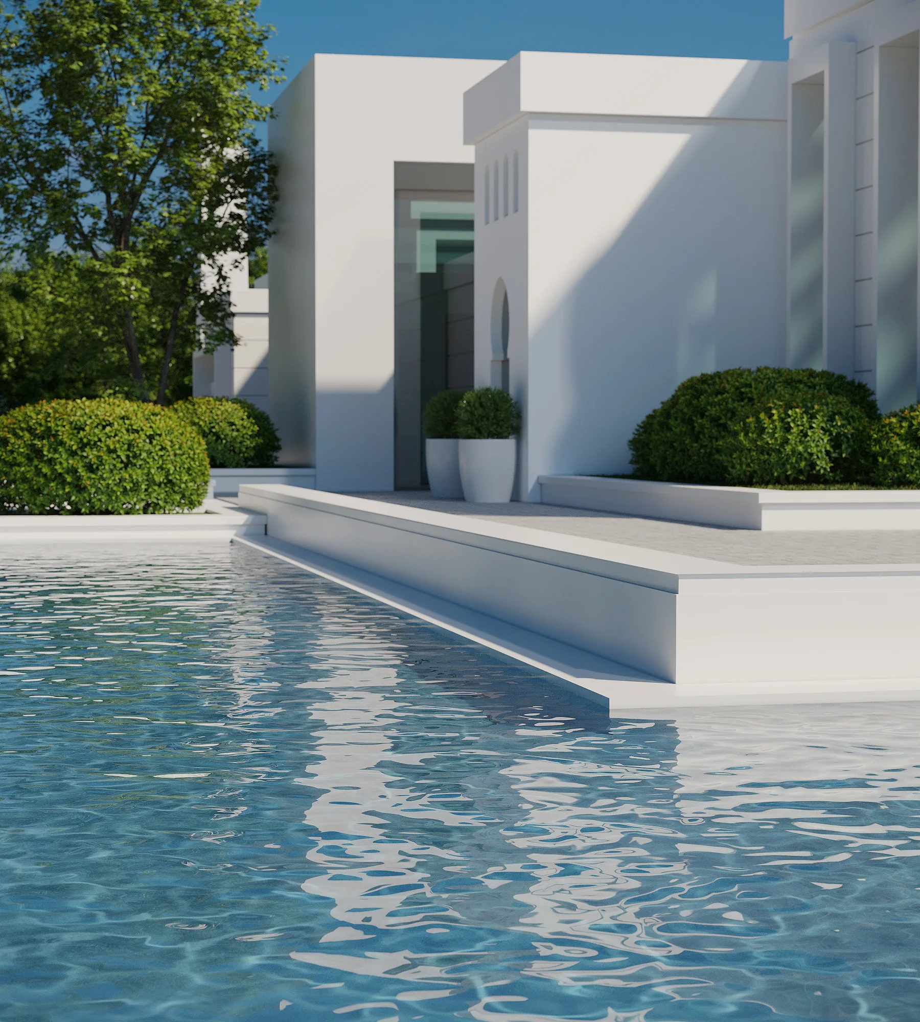 The water basin in the courtyard of the Batyr Zakirov Foundation in Tashkent: the pool edge and the white volumes of the buildings — SAD studio